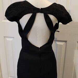 Little black dress with cap sleeves, backless